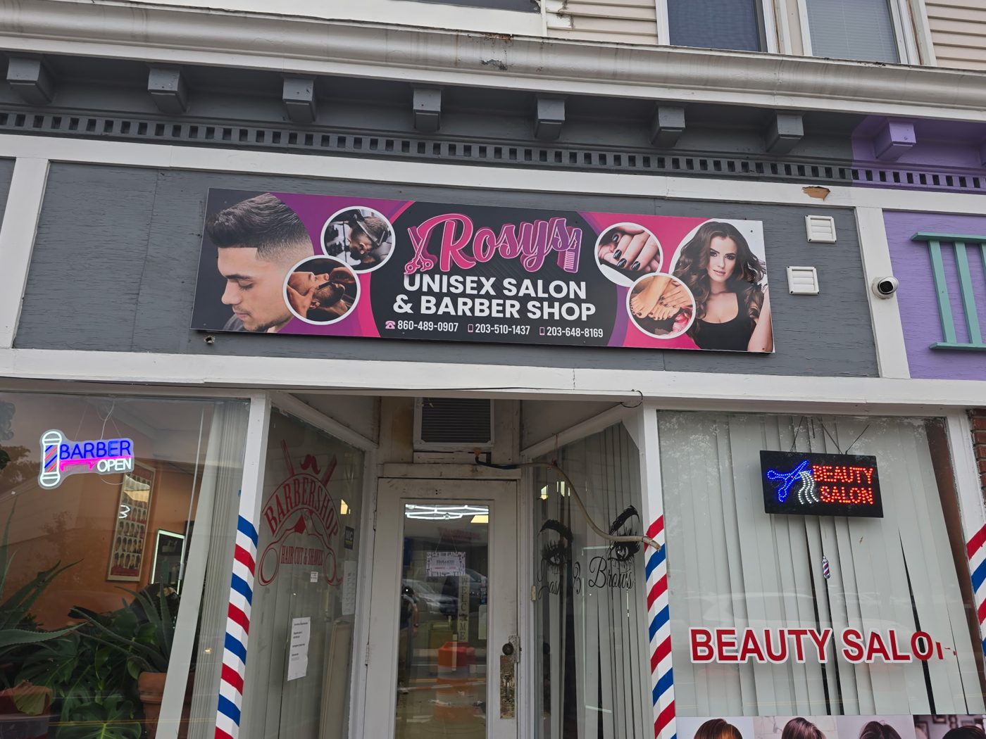 Aluminum storefront sign for a salon and barber shop