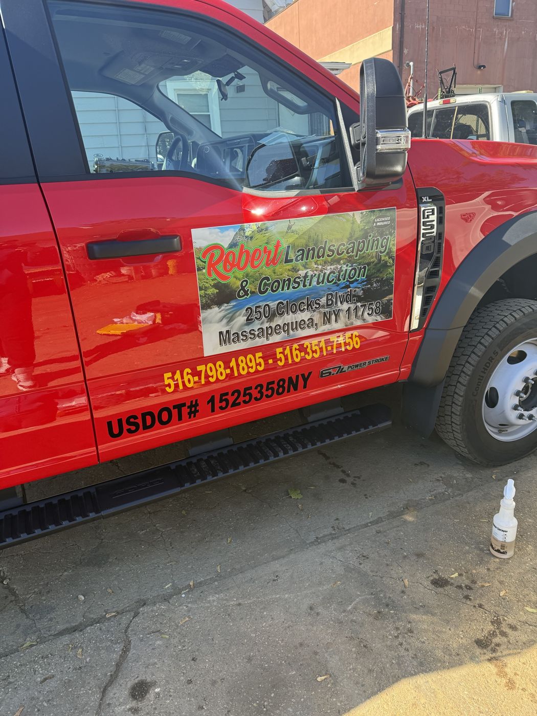 Door graphics and lettering for a landscaping truck